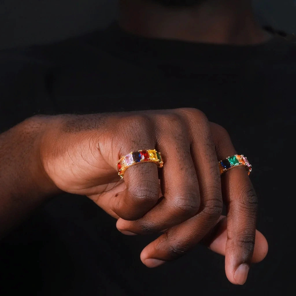 RDRIP JEWELRY Iced Out Rainbow Baguette Eternity Ring men hand model wearing shot multicolor baguette cut cubic zirconia full band gold plated hip hop statement ring for men women urban bling fashion jewelry
