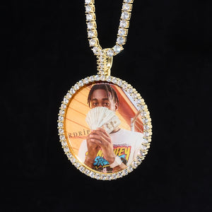 Our Large 3D Circle Custom Picture Pendant is the standout personalized hip-hop charm designed to hang perfectly on all your favorite chains. This oversized 3D round photo medallion features a full border of brilliant VVS cubic zirconia stones, creating icy, eye-catching sparkle for every streetwear fit.
