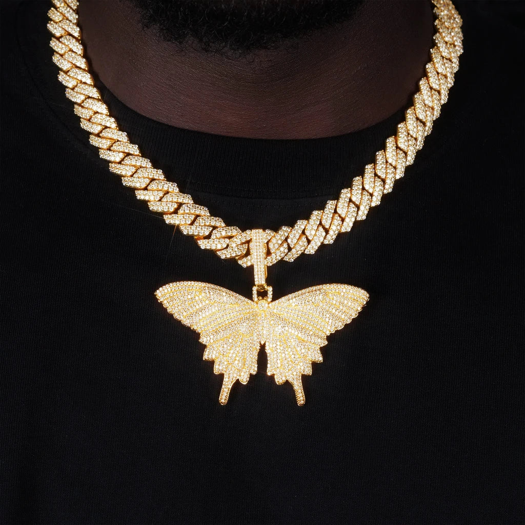 Micro‑pave iced out 18k gold plated butterfly pendant necklace worn on model with iced miami cuban link chain fully paved flawless VVS simulated diamonds hip hop street fashion wearing shot for men RDRIP JEWELRY
