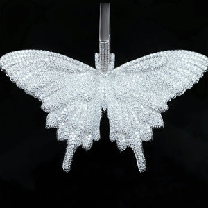 Micro‑pave iced out white gold butterfly pendant necklace fully covered flawless VVS simulated diamonds bling hip hop street jewelry for men women close up shot RDRIP JEWELRY
