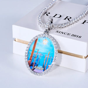 Front view of Oval Round Halo Custom Photo Pendant, personalized custom picture medallion encircled with sparkling stones, RDRIP branded hip hop photo necklace matched with icy tennis chain