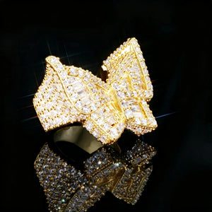 Gold plated oversized 3D butterfly iced ring side angle view full micro pave baguette aaa cubic zirconia hip hop mens bling statement ring sparkling icy stones black reflective surface product shot RDRIP JEWELRY
