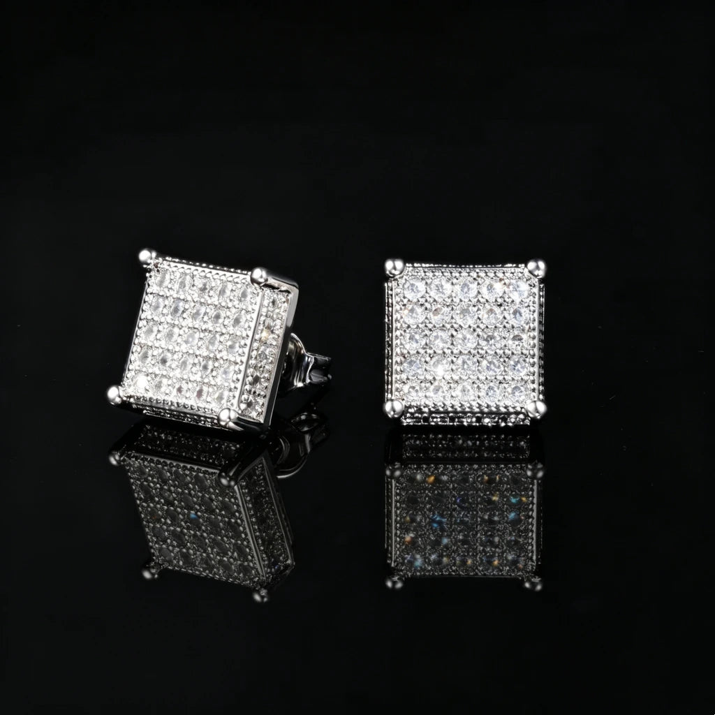 Silver plated Quad Corner Iced Square Stud Earrings, fully micro pave VVS simulated diamond square hip hop stud earrings for men, square grid iced out earrings with four corner ball details on black reflective background
