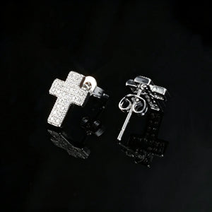 18K Silver Plated Faith Cross Hip Hop Stud Earrings, fully iced micro pave VVS simulated diamond cross studs showing front and screw back structure, unisex bling hip hop jewelry for men women black reflective background RDRIP JEWELRY
