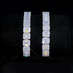 Vertical studio shot showing two pieces of 8mm rectangular baguette cut VVS1+ D color moissanite tennis bracelets laid side by side on black velvet cushion, solid S925 sterling silver base available in white gold plated and 18K gold plated finish, hand prong-set mixed baguette and round brilliant moissanite stones with dazzling rainbow fire and icy shine, tarnish-free men’s hip hop streetwear wrist stacking bracelet, moissanite stone hard enough to pass all handheld diamond testers, two size options 7 inch 