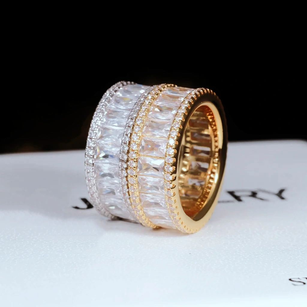 18K gold plated wide baguette eternity ring double sided micro pave setting 8mm full iced out band flawless VVS simulated diamonds heavy bling hip hop men statement ring displayed on brand paper background RDRIP JEWELRY
