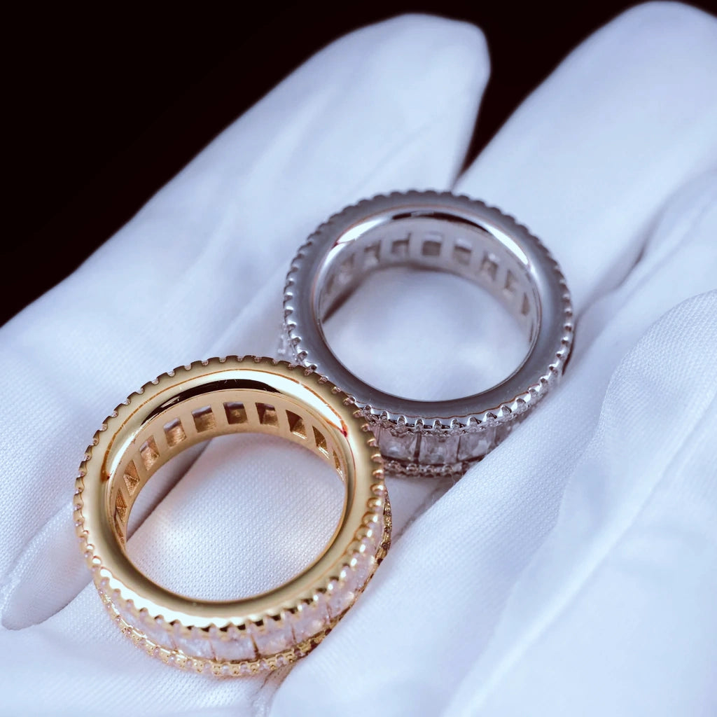 Top inner band view of gold and white gold plated wide baguette eternity rings double sided micro pave 8mm band flawless VVS simulated diamonds men hip hop icy bling rings displayed on white cotton glove showing ring interior structure RDRIP JEWELRY
