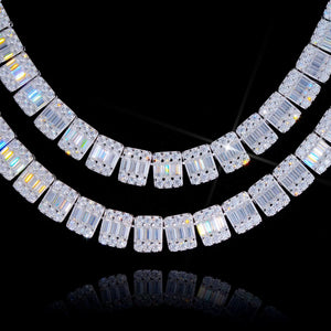 Studio product shot of double layered 8MM rectangular baguette cut VVS1+ D color moissanite tennis link chain, solid S925 sterling silver with polished white gold finish, square cluster design mixed baguette and round brilliant moissanite stones, clear mirror reflection on glossy black background, intense rainbow fire and light refraction, 9.25 Mohs hardness genuine moissanite not cheap cubic zirconia simulants, hand prong set hip hop icy bling necklace, stackable luxury streetwear jewelry for men, all high