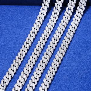 Macro close up shot of four strands 10mm full iced out silver miami cuban link chains side by side, fully pave set flawless VVS grade simulated diamond stones, shiny reflective bling surface, solid matte black textured background, 18K white gold plated stainless steel hip hop men necklace, hand prong encrusted flood ice cuban jewelry, multiple size layered cuban chain product detail shot, premium streetwear rap statement bling accessories for men from RDRIP JEWELRY
