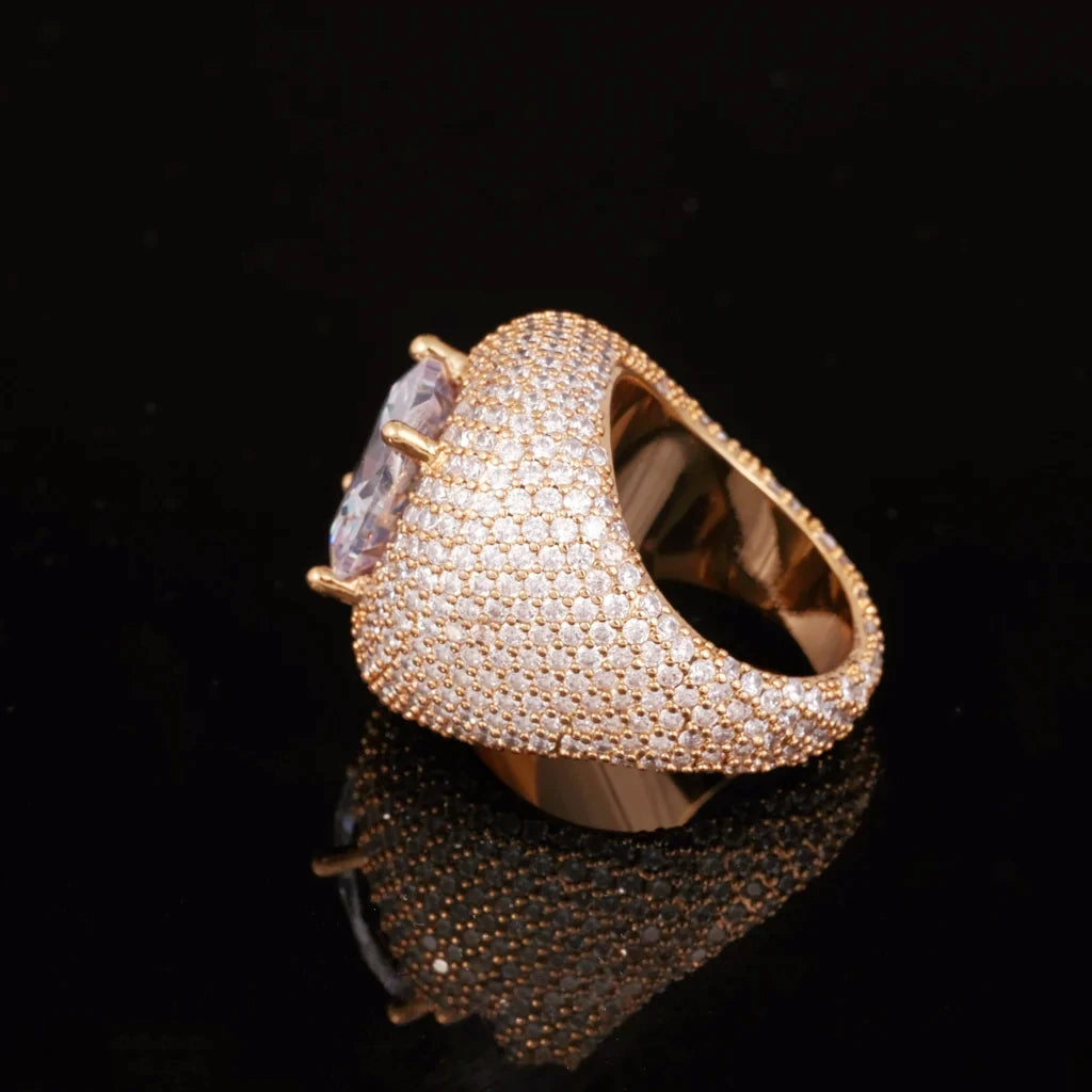 Inner band side angle view of men hip‑hop Glory Dome Iced Clustered Band Ring, 18K gold plated finish, showing inner gold band structure, large round brilliant cut center stone with gold four‑prong setting, full layered micro pave hand‑set VVS flawless simulated diamonds dome exterior, heavy‑weight luxury gold bling men statement ring, photographed on black glossy reflective background RDRIP JEWELRY
