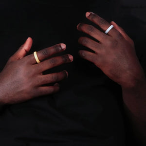 Two men hands displaying 18k gold plated and silver tone multi‑row micro pave aaa cubic zirconia full eternity iced out rings, 6mm hip hop bling band side by side comparison shot, dark skin model lifestyle presentation, RDRIP JEWELRY SINCE 2016
