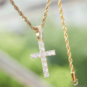 gold toned 925 sterling silver bling classic cross pendant with full rope chain and visible clasp, encrusted with brilliant vvs simulated diamonds, outdoor bokeh background shot, iced religious hip hop necklace for men RDRIP JEWELRY
