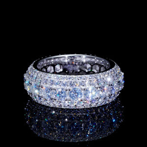 Heavy multi‑pave layered full iced‑out men’s eternity band ring, hand‑set VVS1 D‑color round hearts and arrows cut moissanite stones, 9mm wide S925 sterling silver white gold plated hip hop statement ring, shot on black background with crystal reflection, luxury bling men jewelry for street fashion, RDRIP JEWELRY
