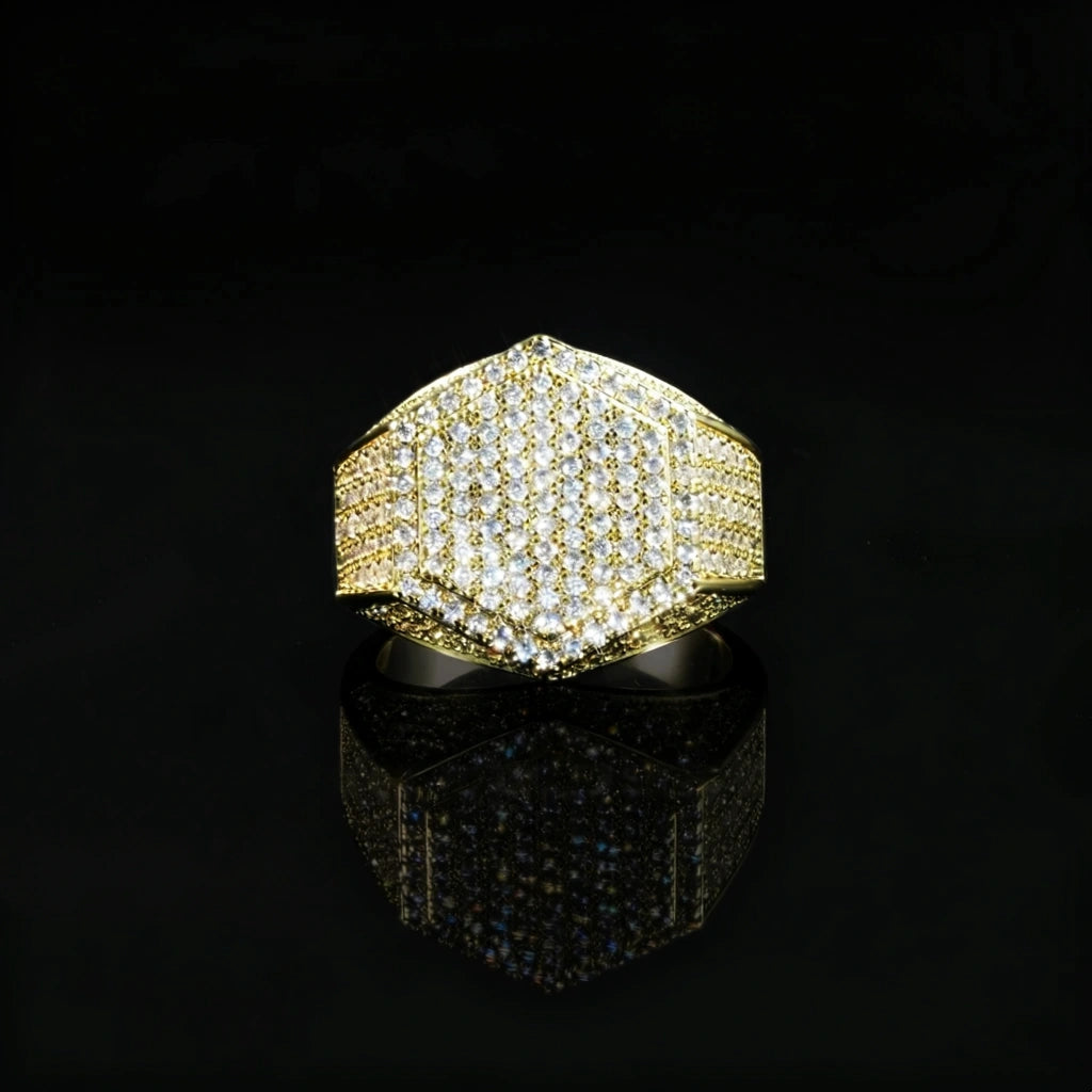 Gold plated men hip‑hop hexagon signet ring full front view shot full micro‑inlay pave set brilliant cubic zirconia stones icy bling hexagonal rapper statement ring polished gold finish with sparkling crystal shine clear mirror reflection on glossy black background luxury men jewelry RDRIP JEWELRY
