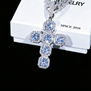 Iced Large Halo Gemstone Cross Pendant laid on RDRIP JEWELRY gift box SINCE 2016, full iced‑out 6‑stone cushion halo cross pendant with VVS simulated diamonds white gold plated, premium hip hop men bling jewelry studio product photography RDRIP JEWELRY
