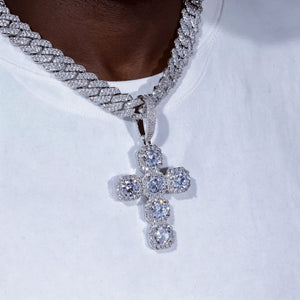 Iced Large Halo Gemstone Cross Pendant silver finish worn on black man neck paired with white t shirt, fully iced‑out 6‑stone cushion halo cross pendant set with VVS simulated diamonds silver plated cuban link chain, men hip hop bling religious necklace lifestyle wearing shot RDRIP JEWELRY
