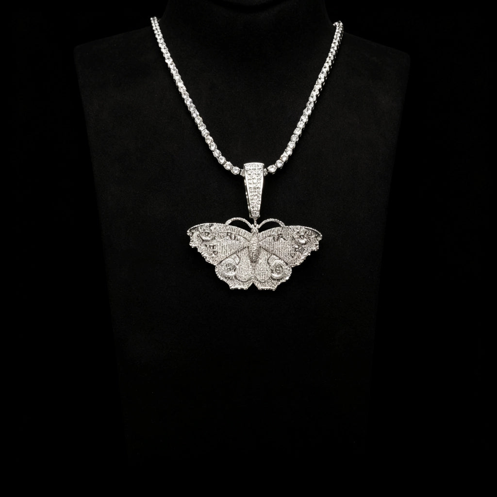 Iced Out Large Vintage Butterfly Pendant displayed on black neck mannequin, full pave AAA cubic zirconia micro inlay hip hop necklace with matching tennis chain, 18k gold plated copper bling street fashion charm for men women RDRIP JEWELRY SINCE 2016
