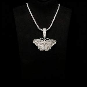 Iced Out Large Vintage Butterfly Pendant displayed on black neck mannequin, full pave AAA cubic zirconia micro inlay hip hop necklace with matching tennis chain, 18k gold plated copper bling street fashion charm for men women RDRIP JEWELRY SINCE 2016
