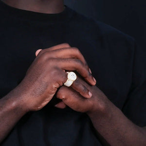 Men hip hop iced out round halo dome ring worn on male hand lifestyle photo full micro pave cubic zirconia real gold plated heavy wide band hip‑hop rapper bling fashion statement jewelry RDRIP JEWELRY
