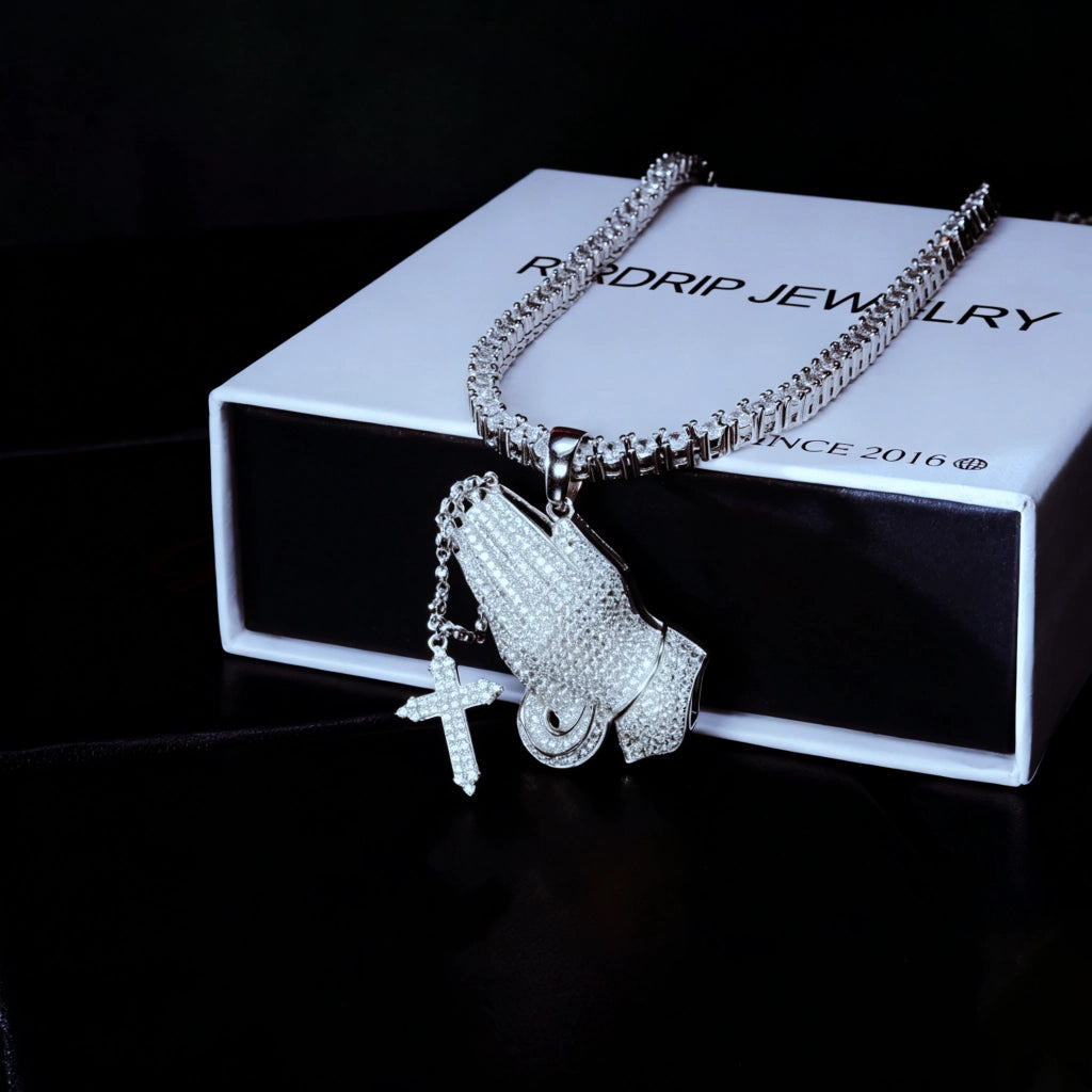 Iced out praying hands pendant with dangling cross charm laid on brand gift box, s925 silver white gold plated full vvs simulated diamonds hip hop faith men necklace premium bling gift set street fashion jewelry RDRIP JEWELRY

