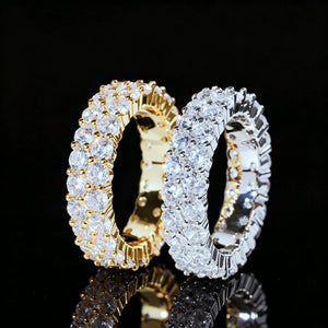 RDRIP JEWELRY iced out double row eternity band ring gold silver two tone set prong‑set 3mm round VVS simulated diamonds full iced hip hop men stackable ring 6mm width copper base bling jewelry with black reflective background studio shot
