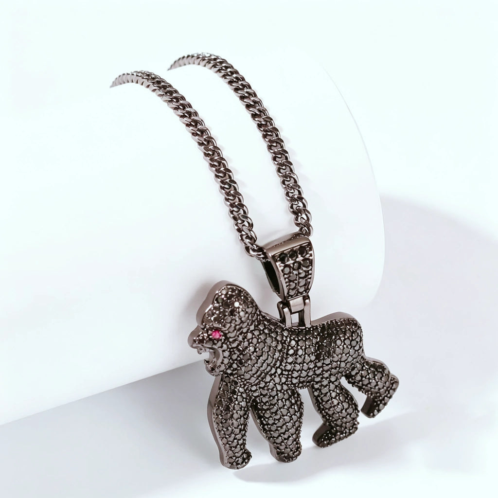 iced out roaring gorilla pendant black gun metal finish full paved aaa cz cubic zirconia with pink eye detail paired with cuban chain lifestyle studio shot mens hip hop streetwear bling necklace RDRIP JEWELRY

