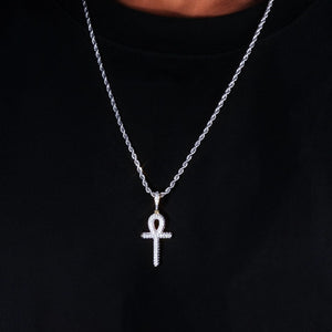 Men model wearing two tone gold silver fully iced out Egyptian Ankh cross pendant with silver rope chain necklace, bling moissanite hip hop outfit layering shot streetwear jewelry RDRIP JEWELRY
