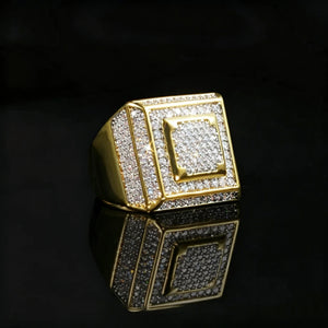 Official Limited micro‑inlay multi‑layer square signet ring front angle shot,18K gold plated heavy men hip hop ring,full pave cubic zirconia bling iced‑out rapper jewelry,multi‑layer square frame design,high polish gold finish,black reflective background,statement wide band men’s fashion ring RDRIP JEWELRY
