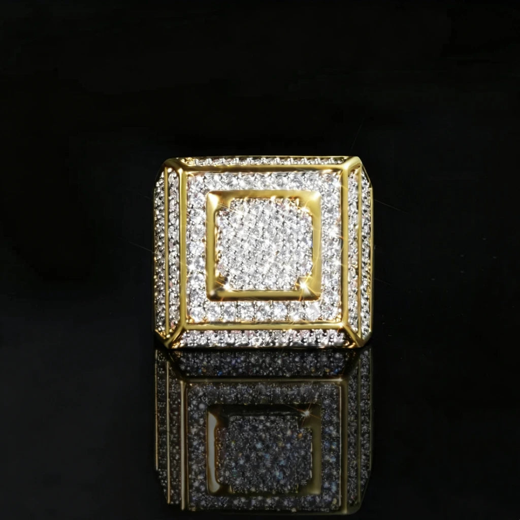 Official Limited micro‑inlay multi‑layer square signet ring top‑down flat view,18K gold plated heavy weight men hip hop statement ring,full pave sparkling cubic zirconia stones,micro‑inlay multi‑layer square frame design,high polished gold metal finish,black glossy reflective background,iced‑out wide band rapper fashion jewelry for men RDRIP JEWELRY

