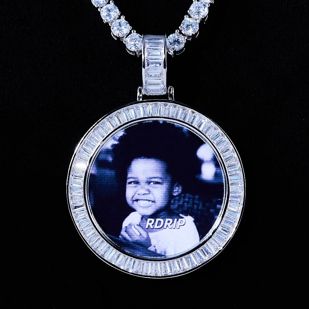 Baguette Iced Out Round Custom Photo Pendant Necklace, white gold tone round medallion with baguette stone frame, custom black and white child portrait photo, matched tennis chain, solid black background studio shot, personalized hip hop memory jewelry, RDRIP JEWELRY
