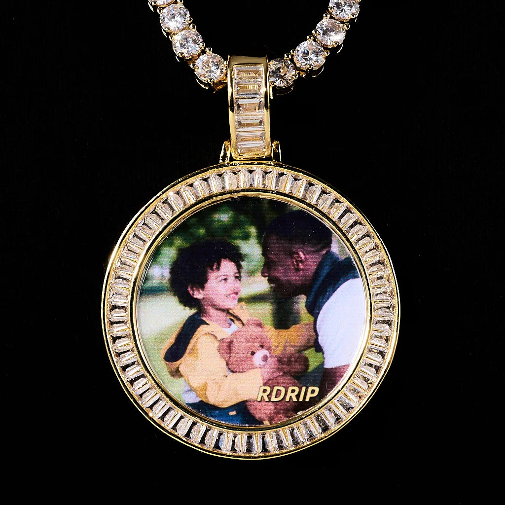 Baguette Iced Out Round Custom Photo Pendant Necklace, yellow gold tone round medallion with baguette stone frame, custom father and child portrait photo, paired with tennis chain, solid black background studio shot, personalized hip hop memory jewelry, RDRIP JEWELRY
