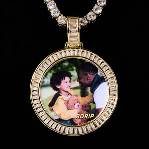Baguette Iced Out Round Custom Photo Pendant Necklace, yellow gold tone round medallion with baguette stone frame, custom father and child portrait photo, paired with tennis chain, solid black background studio shot, personalized hip hop memory jewelry, RDRIP JEWELRY
