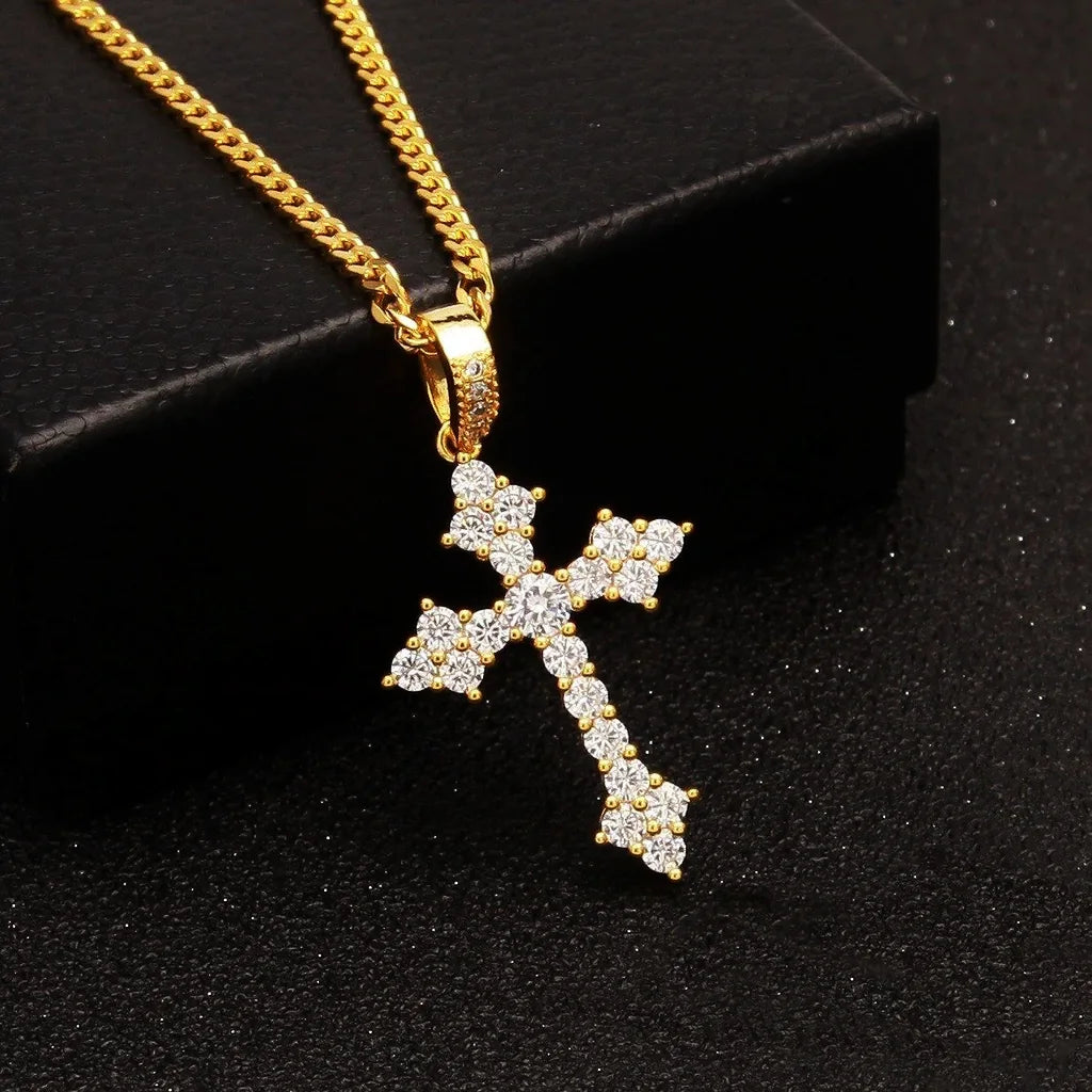 Iced Flower Cluster Cross Pendant 18k gold plated hip hop religious necklace studio shot on black glitter textured surface, flawless VVS simulated diamond flower cluster cross charm with detailed iced bail and cuban link chain unisex bling street fashion jewelry RDRIP JEWELRY
