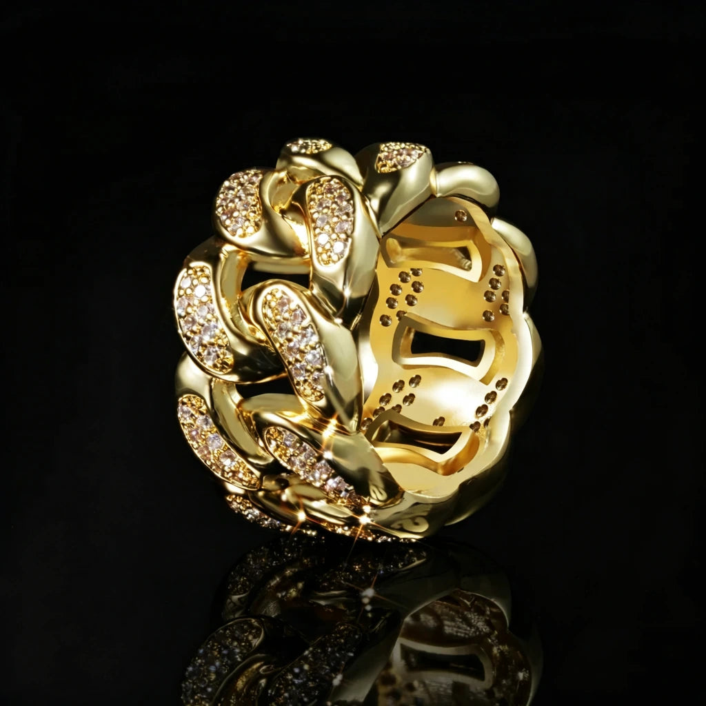Iced out hollow wide band miami cuban link men ring, 18k gold plated micro pave cubic zirconia stones, bold iced hip hop statement jewelry by RDRIP JEWELRY, detailed inner hollow structure view, black reflective background shot
