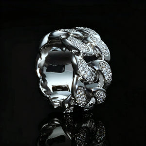 Side inner view of iced out silver tone miami cuban link men ring, micro pave cubic zirconia stones, thick hollow wide band hip hop statement jewelry, shot on black reflective background with mirror reflection effect by RDRIP JEWELRY
