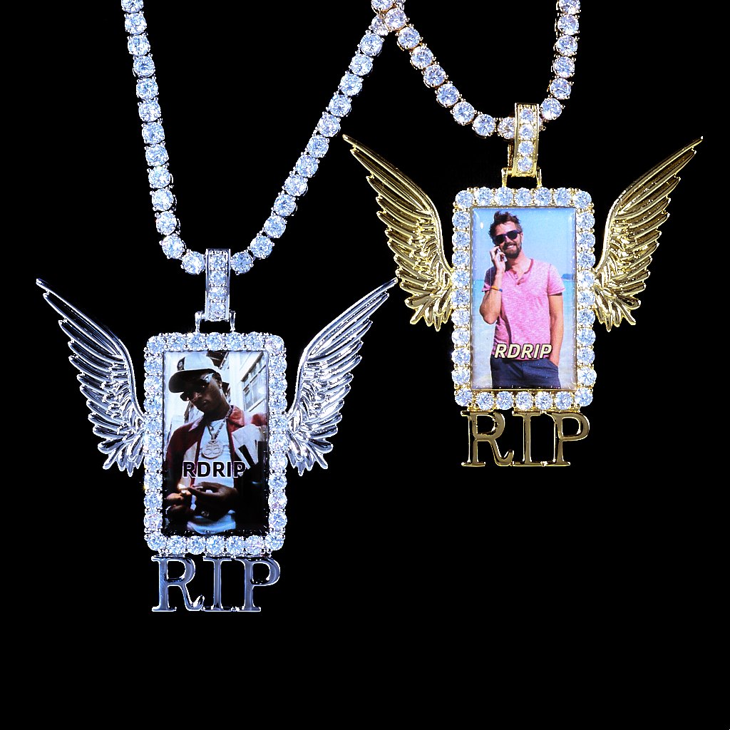 Iced Out Wings RIP Custom Photo Pendant, gold tone and white gold tone duo hanging front view, angel wing rectangular custom photo frame pendant with RIP letter decoration, round stone border, matched tennis chains, solid black background, memorial personalized hip hop keepsake jewelry, RDRIP JEWELRY
