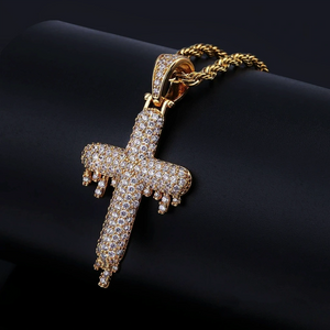 RDRIP JEWELRY SINCE 2016 18k gold plated Iced Out Dripping Cross Pendant close up studio product shot, fully micro paved cubic zirconia melting drip cross hip hop necklace with twisted rope chain, sparkling iced out men hip hop street fashion jewelry gold finish

