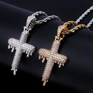 RDRIP JEWELRY SINCE 2016 Iced Out Dripping Cross Pendant two color options silver and 18k gold plated displayed side by side, fully micro paved cubic zirconia melting drip cross hip hop pendants with twisted rope chains, men iced out street jewelry multiple finish choices
