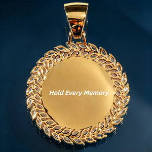LARGE 3D DELUXE WHEAT EAR CUSTOM PICTURE PENDANT, gold plated upgraded sunflower style custom photo medallion, macro shot of pendant back with customizable engraved wording "Hold Every Memory", hollow multi-layer wheat ear border, premium product display on even dark blue tempered glass surface, RDRIP JEWELRY
