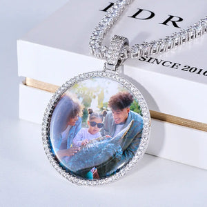 Medium 3D Circle Custom Picture Pendant, custom memory family photo round medallion, iced out border hip hop pendant necklace with tennis chain placed on branded gift box, lifestyle product shot on white tabletop, RDRIP JEWELRY
