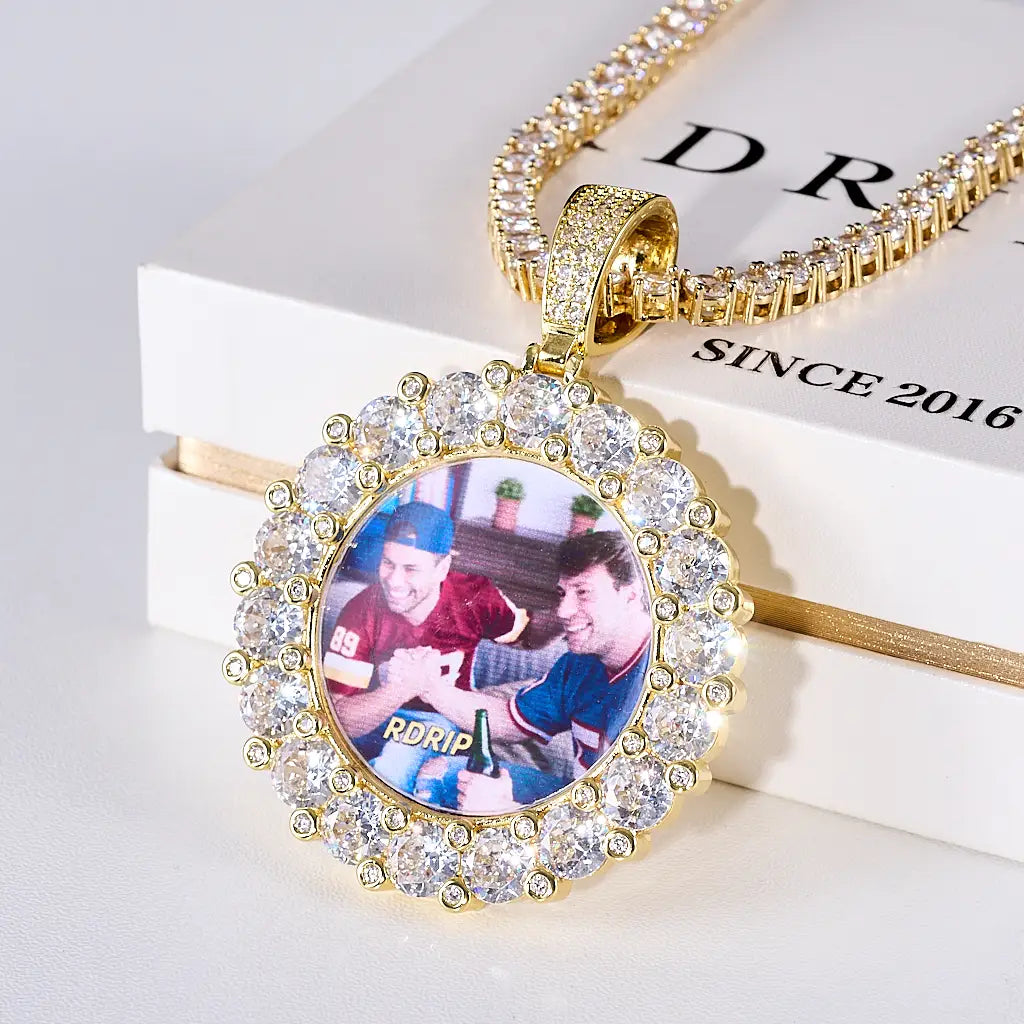 Round Big Stone Halo Custom Photo Pendant Necklace back view, gold tone blank round medallion with custom engraving space, large stone halo frame, matched tennis chain, product shot on plain white background, RDRIP JEWELRY personalized hip hop memory jewelry
