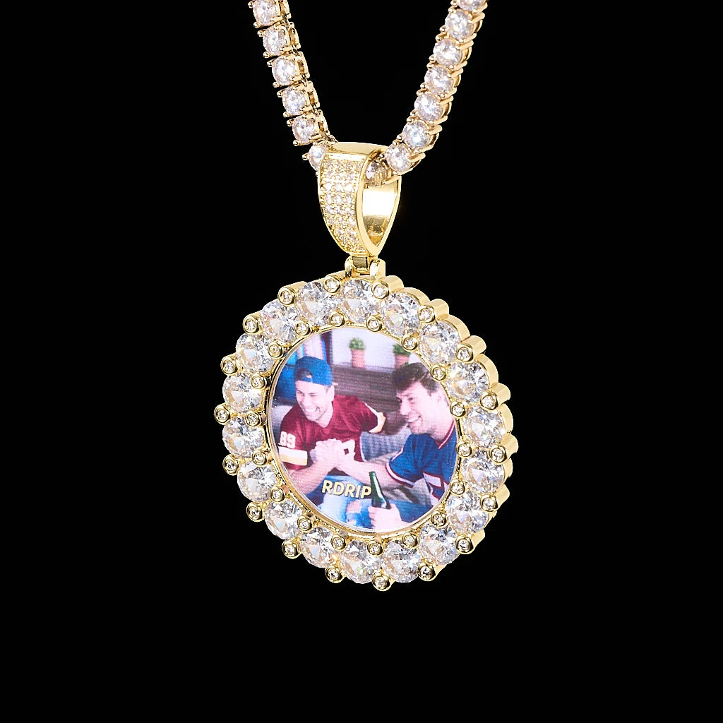 Round Big Stone Halo Custom Photo Pendant Necklace, gold tone circular custom picture medallion with large surrounding stones, paired with tennis chain, studio shot on solid black background, personalized hip hop memory jewelry, RDRIP JEWELRY
