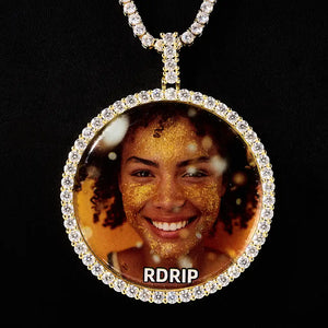 VVS MOISSANITE LARGE 3D CIRCLE CUSTOM PICTURE PENDANT, gold plated round custom memory photo charm, iced out diamond border personalized portrait medallion hip hop jewelry paired with tennis chain, close-up product photo on black background, RDRIP JEWELRY
