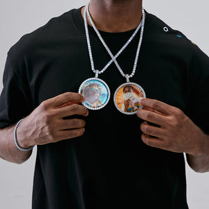 VVS MOISSANITE LARGE 3D CIRCLE CUSTOM PICTURE PENDANT, paired iced out round custom memory portrait photo medallions, personalized hip hop necklace set with tennis chains, lifestyle shot showing two different custom photo pendants worn by male model in black streetwear shirt, RDRIP JEWELRY
