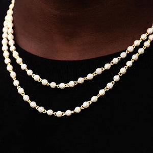 Neck layering wearing shot of RDRIP 4mm Iced Stellar Ball Bead Chain, 18K gold plated men hip hop necklace, fully paved flawless VVS simulated diamonds round ball bead link chain, layered chain styling against black crew neck shirt, brilliant sparkling iced‑out streetwear jewelry for men, RDRIP JEWELRY SINCE 2016
