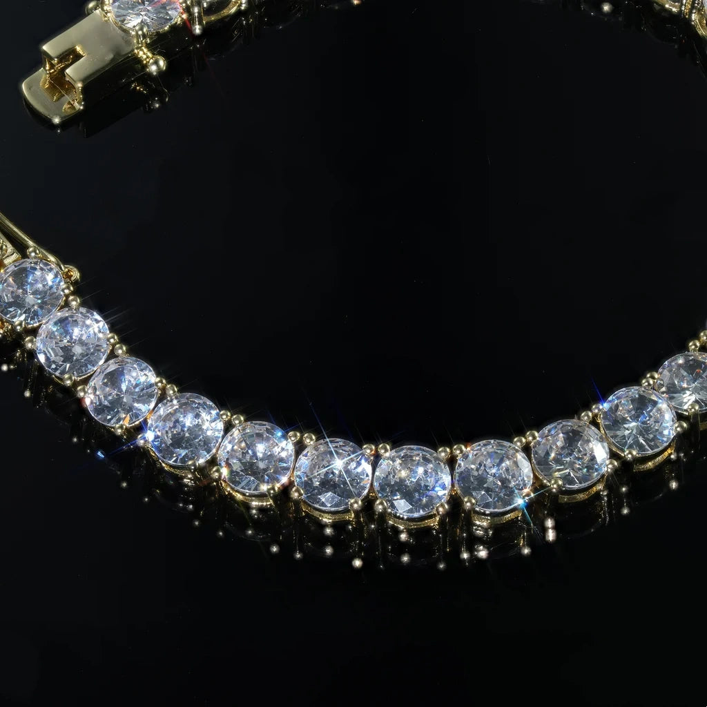 RDRIP 6mm 18k gold plated cubic zirconia tennis bracelet macro close‑up, premium VVS simulated diamond stones with solid prong‑setting, heavy‑duty secure box clasp, sparkling iced‑out unisex hip‑hop wrist jewelry, great for daily wear and wrist stacking, available in 7‑8 inch sizes RDRIP JEWELRY
