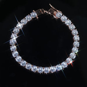 RDRIP 6mm rose gold plated cubic zirconia tennis bracelet, premium VVS simulated diamond iced‑out wrist bracelet, hand prong‑set single row chain with secure lock clasp, bright sparkling bling unisex hip‑hop jewelry, great for daily wear and wrist stacking, available in 7‑8 inch lengths RDRIP JEWELRY
