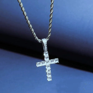 925 sterling silver bling classic cross pendant suspended floating shot against gradient blue background, fully encrusted with brilliant vvs simulated diamonds, matched with polished silver twisted rope chain, sparkling religious iced‑out hip hop men necklace RDRIP JEWELRY
