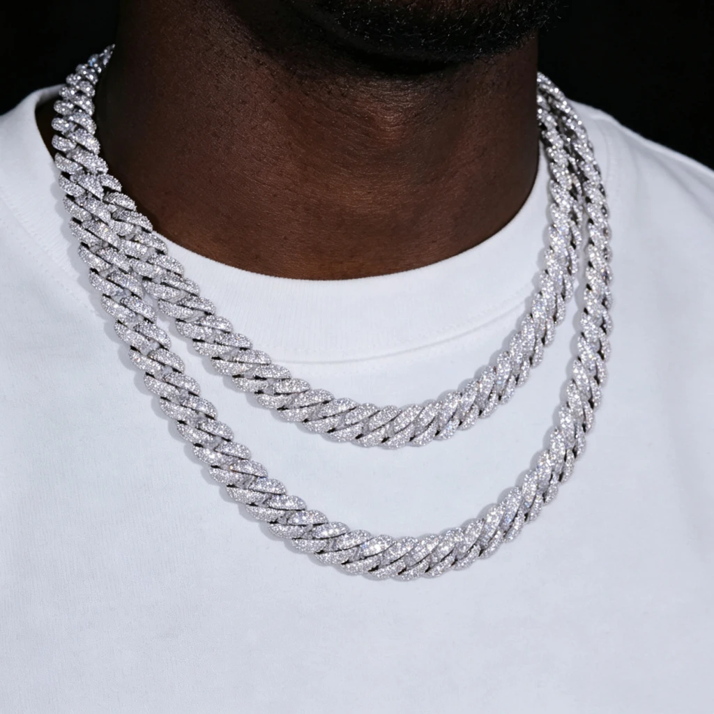 Shop our 10mm Full Iced Out Cuban Link Chain in 18K White Gold Plated, fully set with flawless VVS simulated diamonds. Handcrafted hip hop men necklace, available in 18/20/22 inch lengths. Lifetime warranty & free shipping on all orders.

