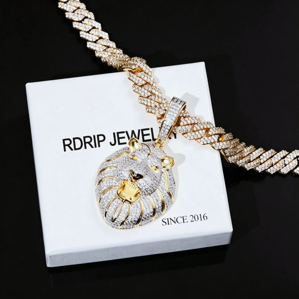 Two tone iced out roaring king lion head pendant necklace, full pave flawless VVS simulated diamonds 18K gold plated mens hip hop jewelry displayed on branded RDRIP JEWELRY gift box against pure black background
